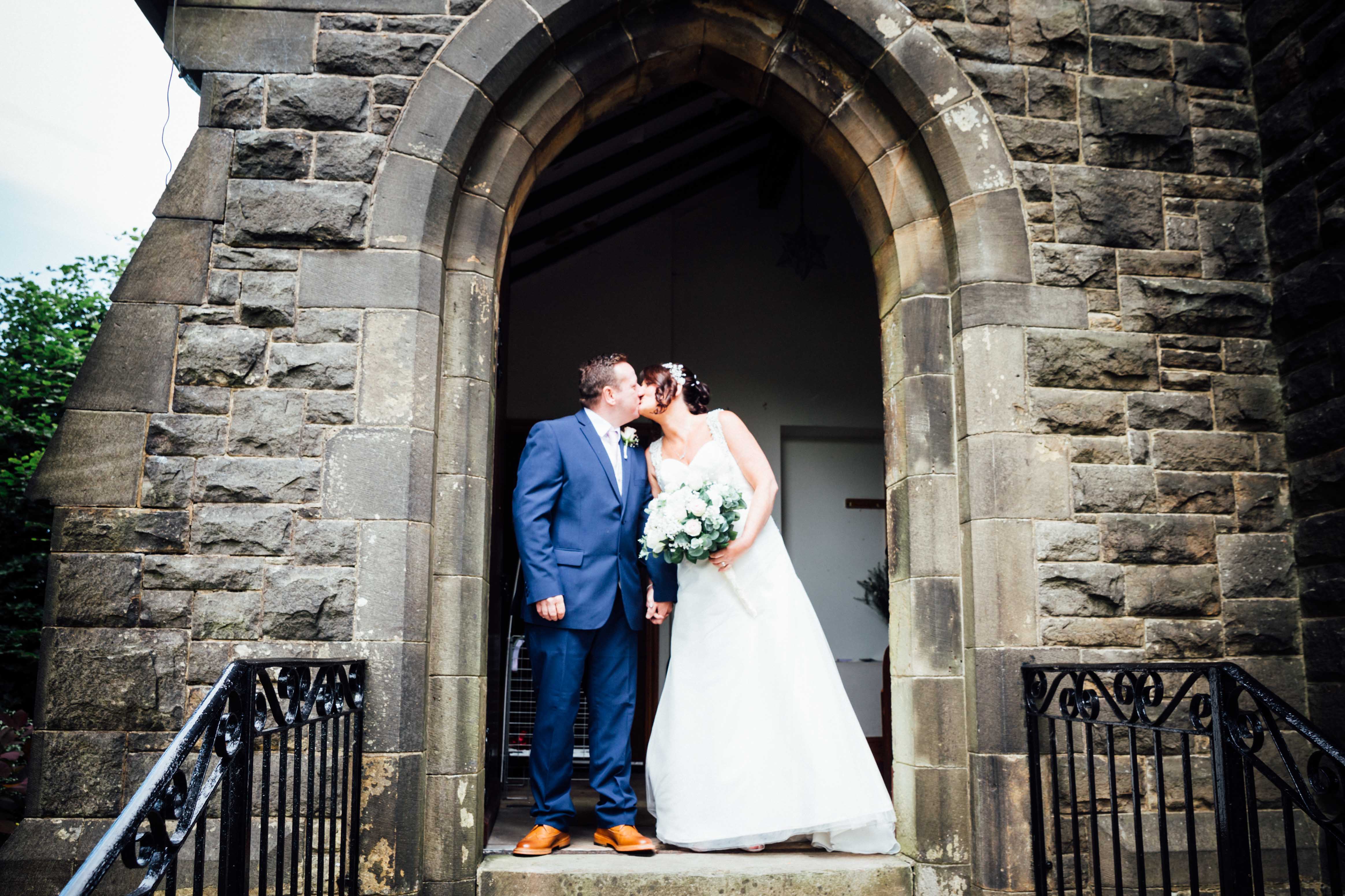 Sheffield wedding - bride & groom at church door