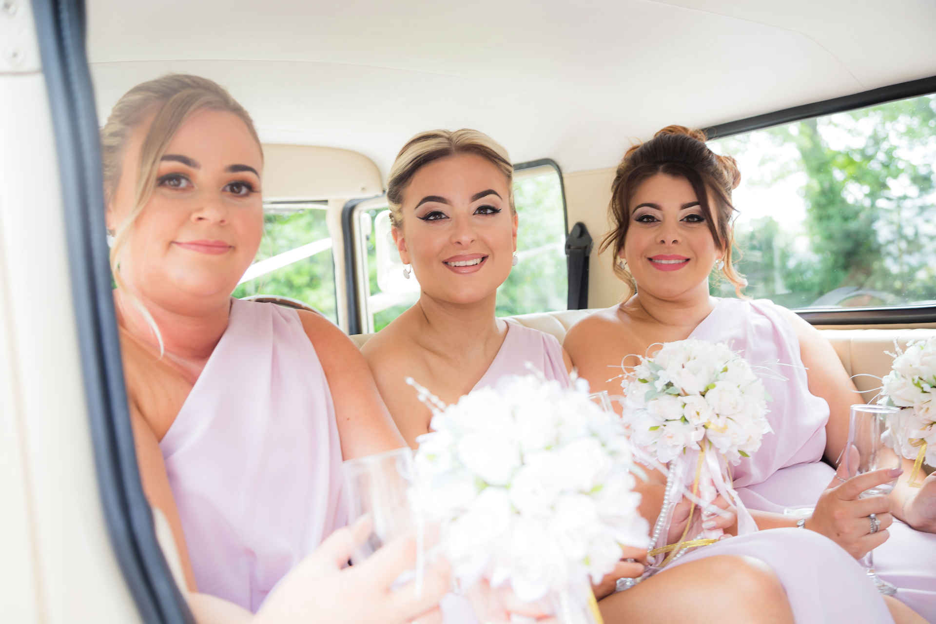Bridesmaids in car at Sheffield wedding