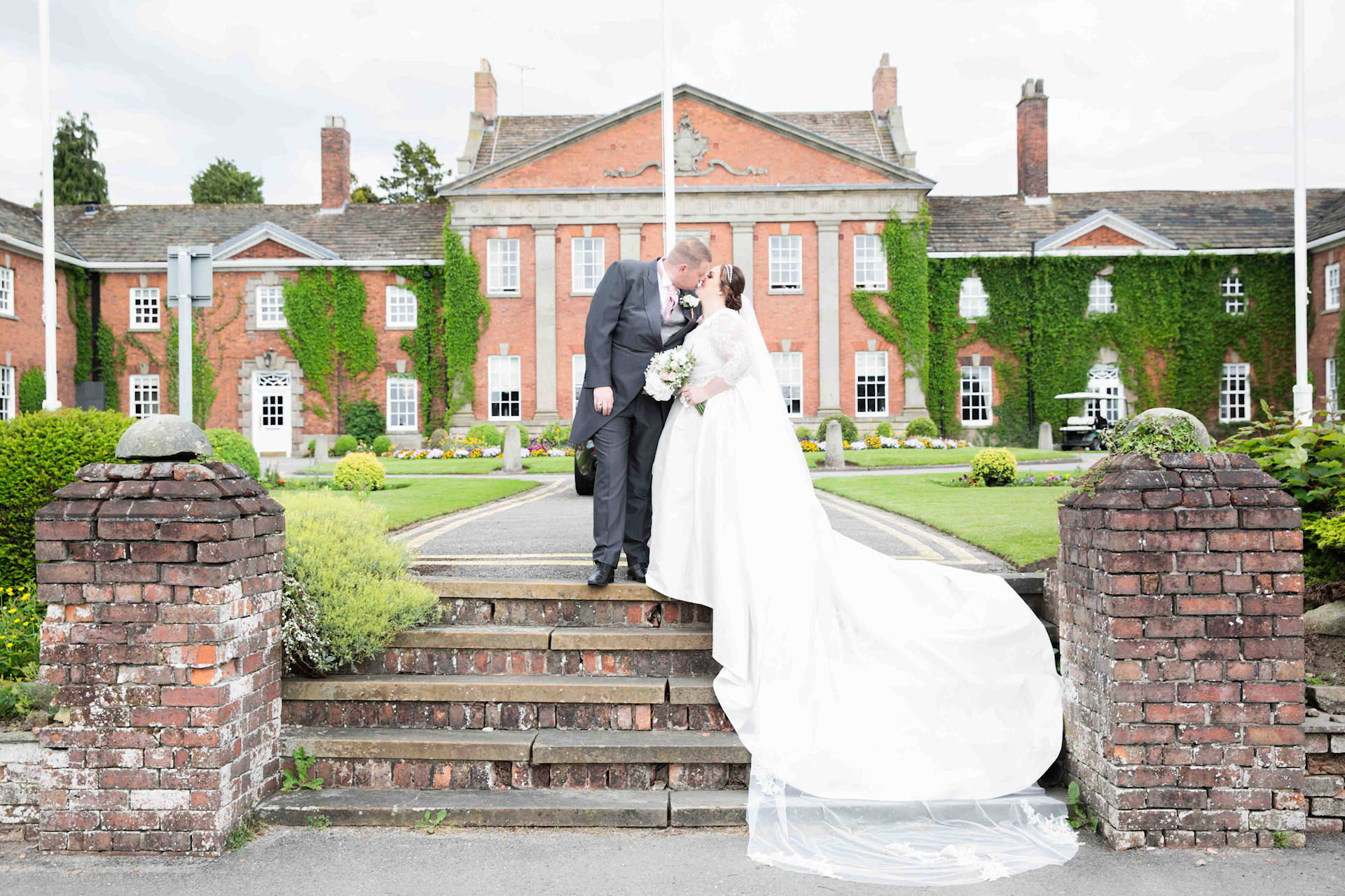 Bride & Groom in front of a stately home in Yorkshire