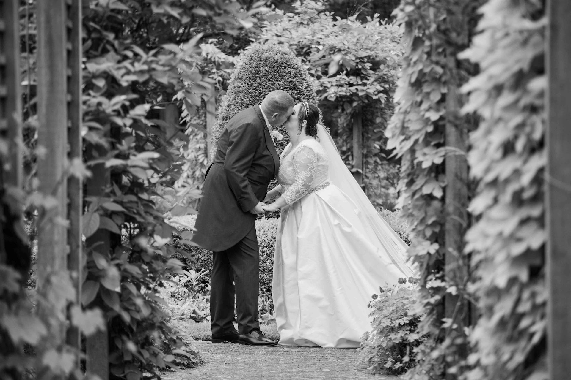 Bride & Groom in a garden at a Yorkshire wedding