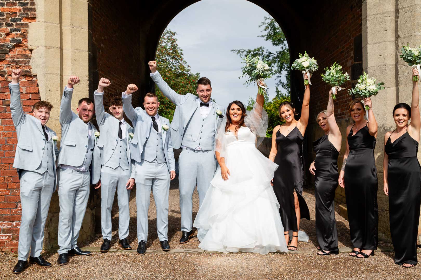 Beth & Carl wedding party at venue entrance